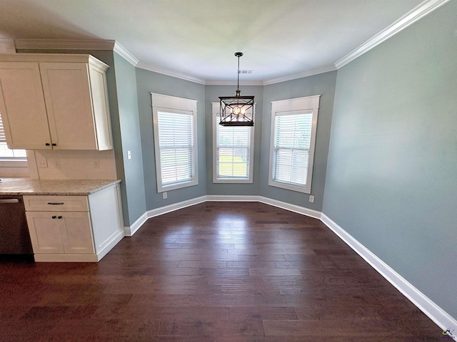 300 Stacy Ln, Warner Robins, GA 31088 - unfurnished dining area featuring dark wood-style flooring and ornamental molding