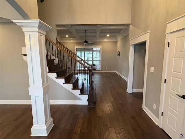 300 Stacy Ln, Warner Robins, GA 31088 - entrance foyer with coffered ceiling, decorative columns, ceiling fan, wood finished floors, and beam ceiling