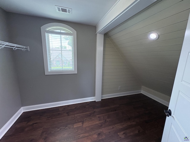 300 Stacy Ln, Warner Robins, GA 31088 - bonus room featuring dark wood-style flooring and vaulted ceiling