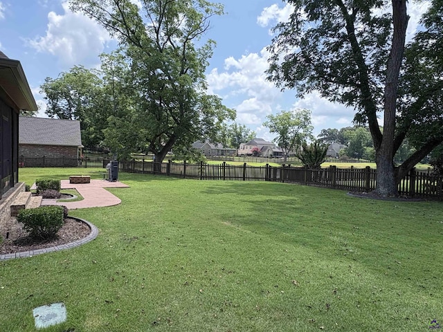 300 Stacy Ln, Warner Robins, GA 31088 - fenced backyard with a patio
