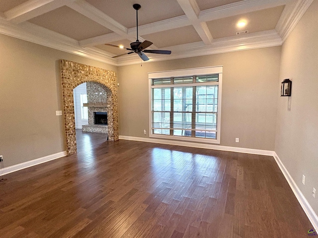 300 Stacy Ln, Warner Robins, GA 31088 - unfurnished living room with healthy amount of natural light, ceiling fan, dark wood-style floors, coffered ceiling, and beam ceiling