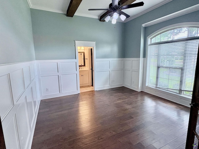 300 Stacy Ln, Warner Robins, GA 31088 - empty room with a decorative wall, beam ceiling, a ceiling fan, dark wood-type flooring, and a wainscoted wall