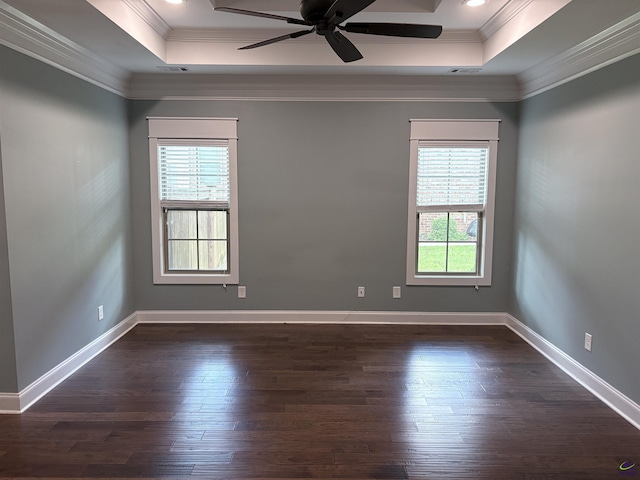 300 Stacy Ln, Warner Robins, GA 31088 - empty room with a tray ceiling, ornamental molding, plenty of natural light, dark wood-style flooring, and recessed lighting