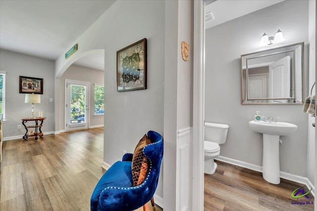 215TYNDALLWAY Tyndall Way, Perry, GA 31069 - half bath featuring wood finished floors and lofted ceiling