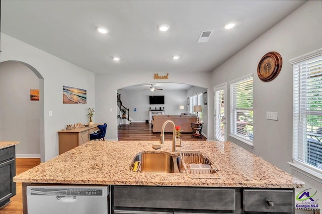215TYNDALLWAY Tyndall Way, Perry, GA 31069 - kitchen with arched walkways, dishwasher, wood finished floors, open floor plan, and recessed lighting