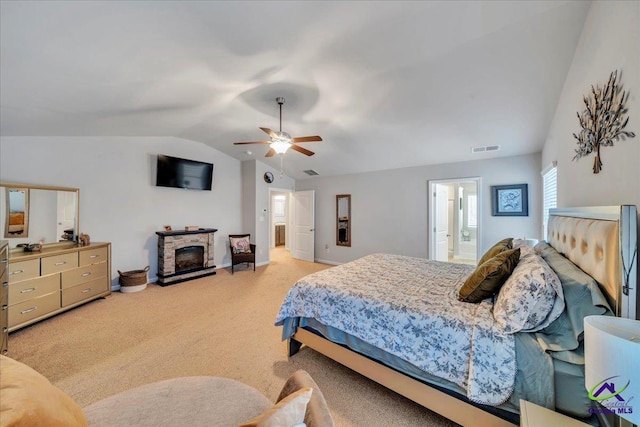 215TYNDALLWAY Tyndall Way, Perry, GA 31069 - bedroom featuring lofted ceiling, light carpet, a ceiling fan, and ensuite bath