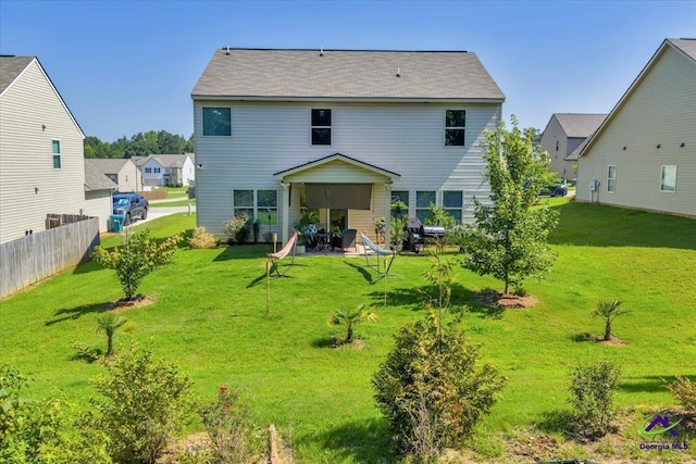 215TYNDALLWAY Tyndall Way, Perry, GA 31069 - back of house with a patio area
