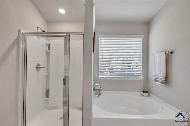215TYNDALLWAY Tyndall Way, Perry, GA 31069 - full bath featuring a stall shower and a garden tub