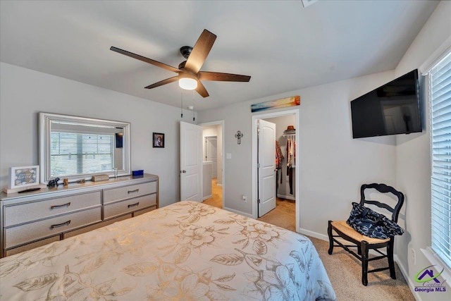 215TYNDALLWAY Tyndall Way, Perry, GA 31069 - bedroom featuring a spacious closet, light colored carpet, a ceiling fan, and a closet