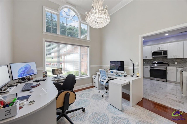 129 Sugarloaf Dr, Macon, GA 31204 - office featuring a chandelier, a high ceiling, light wood-style flooring, and ornamental molding