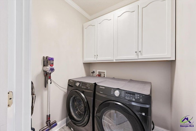 129 Sugarloaf Dr, Macon, GA 31204 - laundry room with washer and dryer, cabinet space, and crown molding