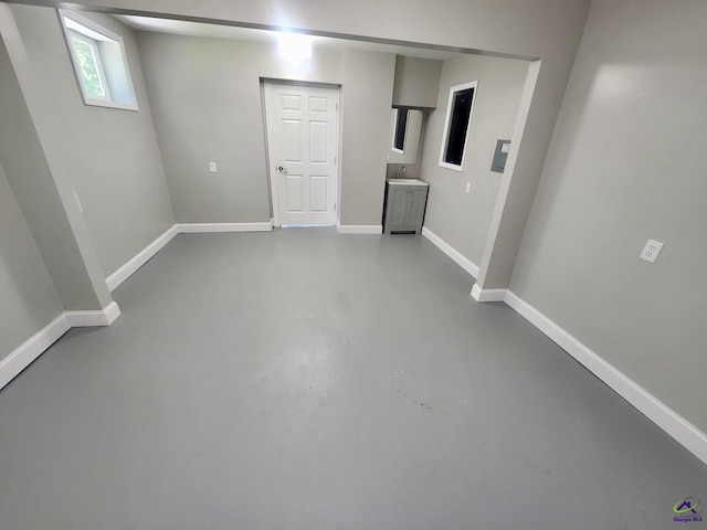 129 Sugarloaf Dr, Macon, GA 31204 - basement with baseboards and a sink