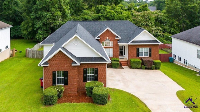 129 Sugarloaf Dr, Macon, GA 31204 - traditional home featuring brick siding, concrete driveway, and roof with shingles