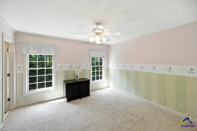 612 Remington Dr, Macon, GA 31210 - carpeted spare room featuring ornamental molding, ceiling fan, and wallpapered walls