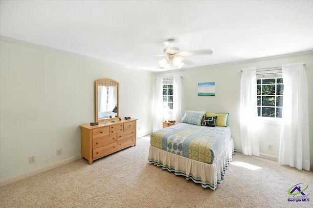 612 Remington Dr, Macon, GA 31210 - bedroom featuring crown molding, light colored carpet, and ceiling fan