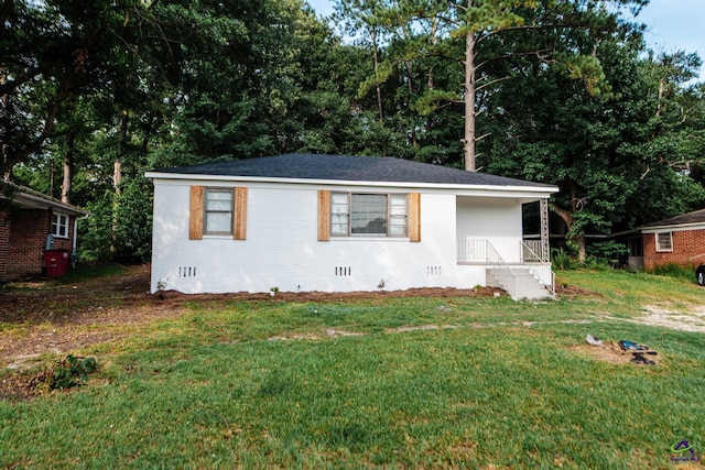 4354 Pio Nono Ave, Macon, GA 31206 - view of front of property with crawl space, a front yard, and brick siding