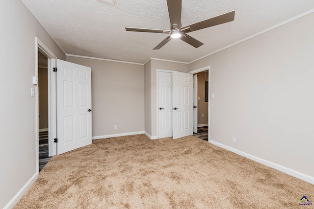 4354 Pio Nono Ave, Macon, GA 31206 - unfurnished bedroom with carpet floors, a textured ceiling, crown molding, ceiling fan, and a closet