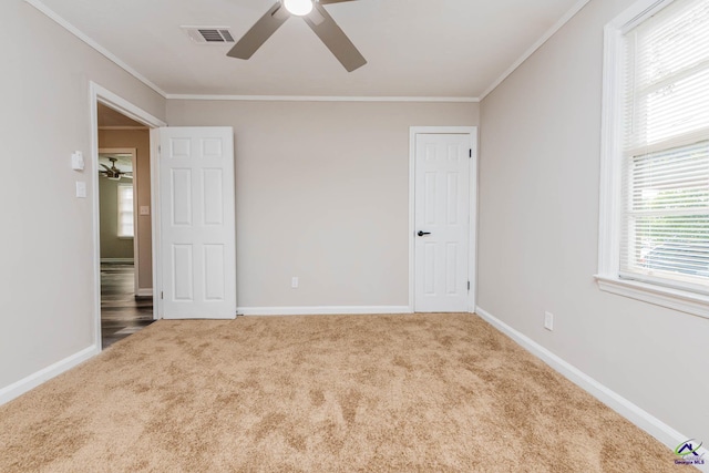 4354 Pio Nono Ave, Macon, GA 31206 - unfurnished bedroom with carpet, ornamental molding, and a ceiling fan