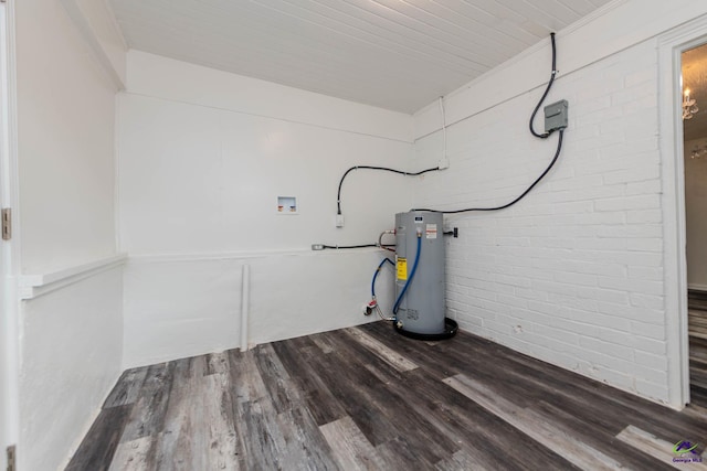 4354 Pio Nono Ave, Macon, GA 31206 - laundry room with water heater, wood finished floors, washer hookup, and brick wall