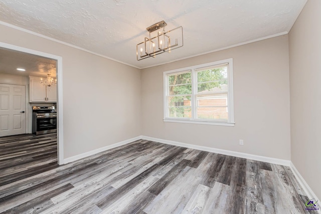 4354 Pio Nono Ave, Macon, GA 31206 - spare room with a chandelier, dark wood-style flooring, crown molding, and a textured ceiling