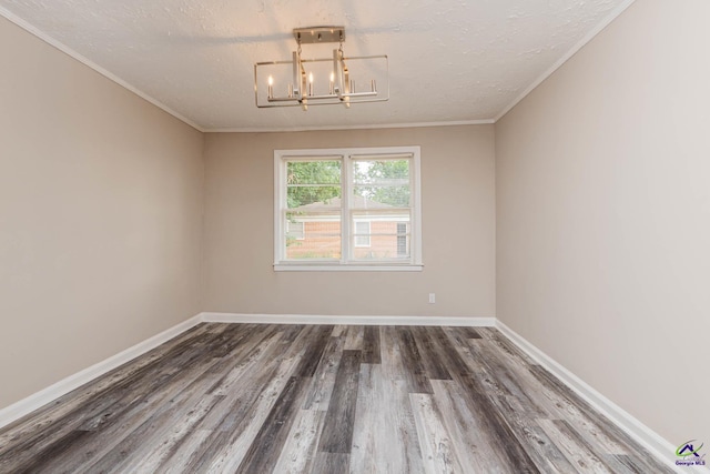 4354 Pio Nono Ave, Macon, GA 31206 - spare room with a chandelier, wood finished floors, crown molding, and a textured ceiling