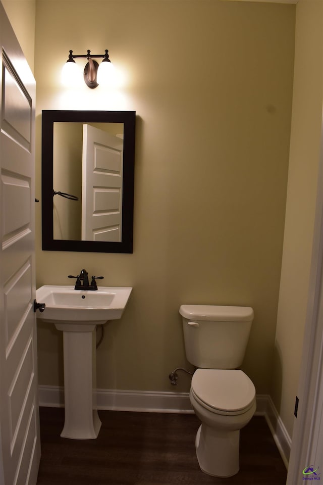 116 Sasanqua Dr, Warner Robins, GA 31088 - half bathroom with baseboards and wood finished floors