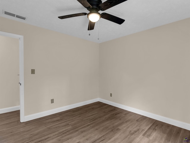 434 Barnes Rd, Jackson, GA 30233 - empty room with dark wood-type flooring and a ceiling fan