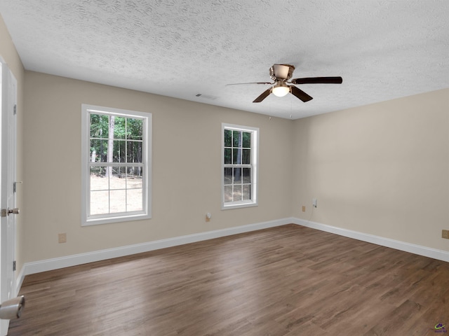 434 Barnes Rd, Jackson, GA 30233 - spare room featuring wood finished floors, ceiling fan, and a textured ceiling