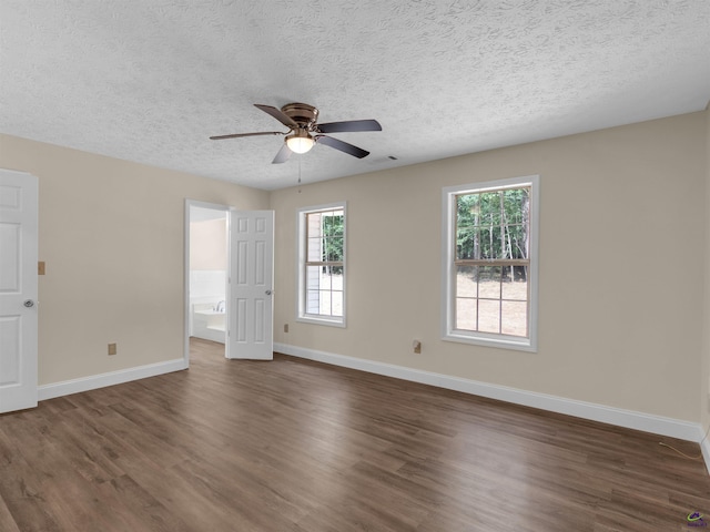 434 Barnes Rd, Jackson, GA 30233 - unfurnished room featuring dark wood-style floors, a ceiling fan, and a textured ceiling