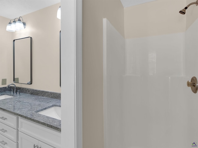434 Barnes Rd, Jackson, GA 30233 - bathroom featuring double vanity and a shower