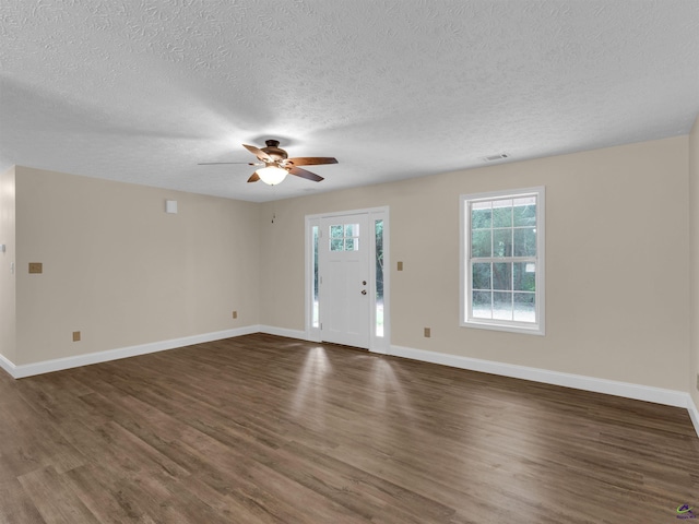 434 Barnes Rd, Jackson, GA 30233 - entrance foyer with dark wood finished floors, a ceiling fan, and a textured ceiling
