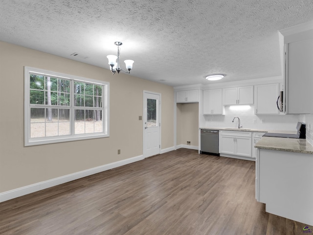 434 Barnes Rd, Jackson, GA 30233 - kitchen with stainless steel dishwasher, stove, a chandelier, wood finished floors, and white cabinetry