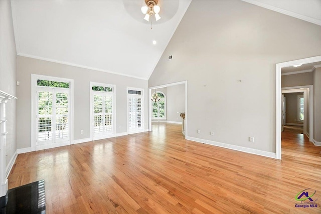208 W Troon, Macon, GA 31210 - unfurnished living room with a ceiling fan, high vaulted ceiling, plenty of natural light, and light wood finished floors