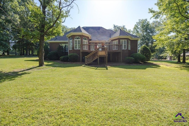 208 W Troon, Macon, GA 31210 - back of property featuring a deck, stairway, and a lawn