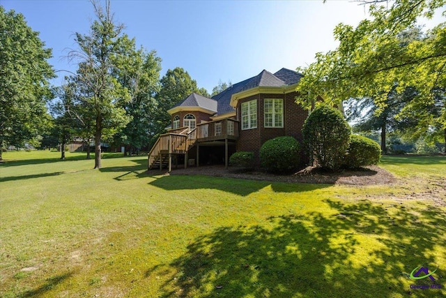 208 W Troon, Macon, GA 31210 - view of green lawn featuring stairs and a wooden deck