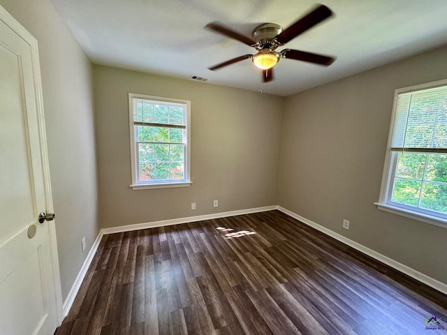 1930 Northbrook Ave, Macon, GA 31204 - unfurnished room featuring healthy amount of natural light, dark wood-style flooring, and a ceiling fan