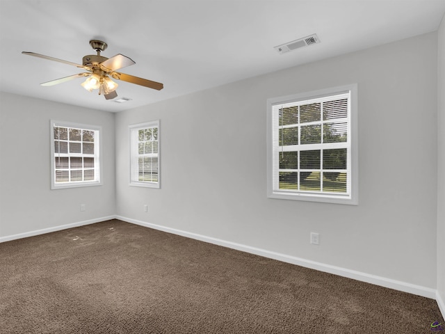 539 Levi Barnes Rd, Jackson, GA 30233 - unfurnished room with dark colored carpet and ceiling fan