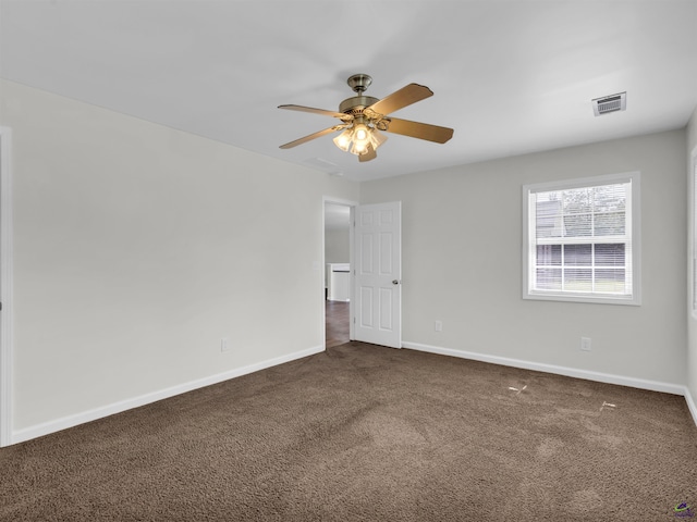 539 Levi Barnes Rd, Jackson, GA 30233 - spare room featuring dark carpet and ceiling fan