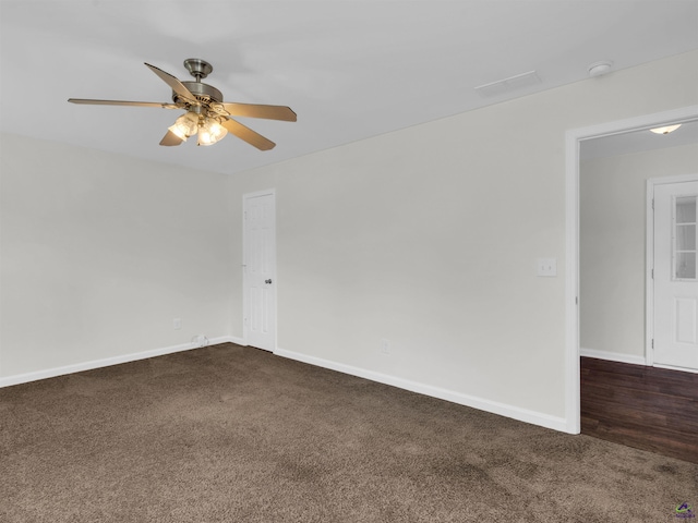 539 Levi Barnes Rd, Jackson, GA 30233 - unfurnished room with dark carpet and ceiling fan