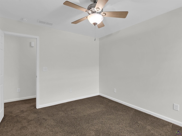 539 Levi Barnes Rd, Jackson, GA 30233 - unfurnished room with dark carpet, a ceiling fan, and a smoke detector