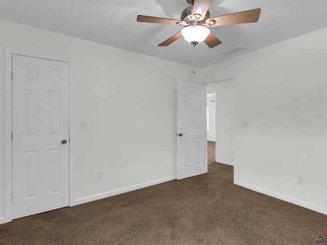 539 Levi Barnes Rd, Jackson, GA 30233 - unfurnished room with dark colored carpet and ceiling fan