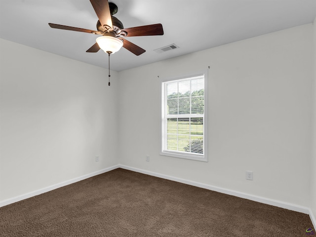 539 Levi Barnes Rd, Jackson, GA 30233 - unfurnished room with dark carpet and a ceiling fan