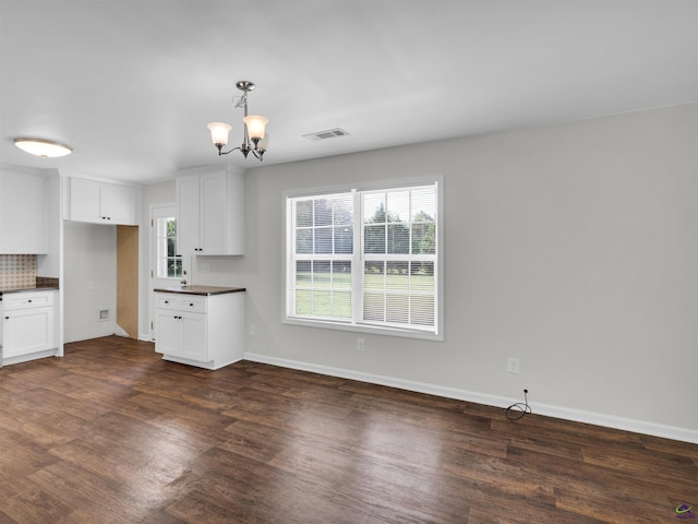 539 Levi Barnes Rd, Jackson, GA 30233 - kitchen featuring dark countertops, plenty of natural light, and dark wood-style floors