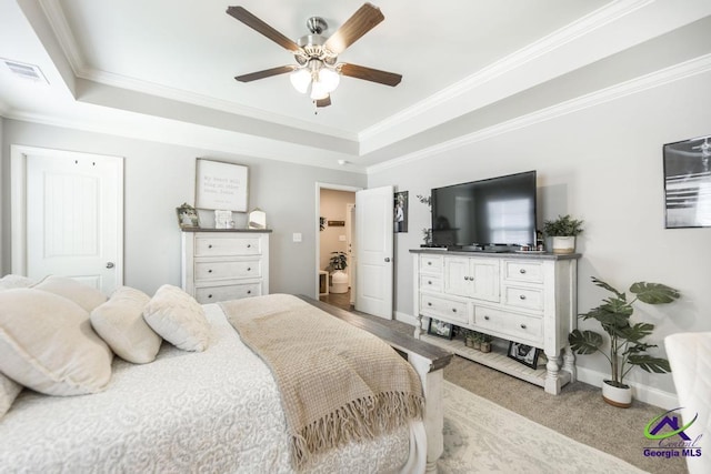 306 Gibson Cir, Kathleen, GA 31047 - carpeted bedroom featuring crown molding, a tray ceiling, and ceiling fan