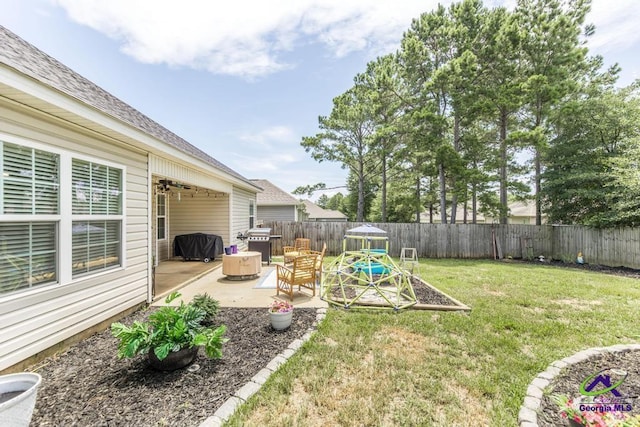 306 Gibson Cir, Kathleen, GA 31047 - fenced backyard with a patio