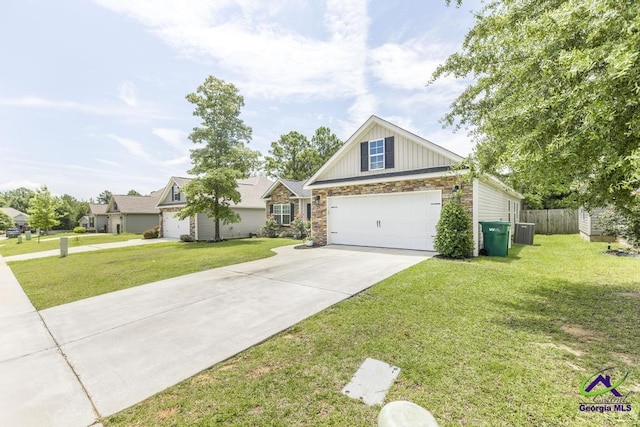 306 Gibson Cir, Kathleen, GA 31047 - craftsman inspired home with driveway, stone siding, and board and batten siding