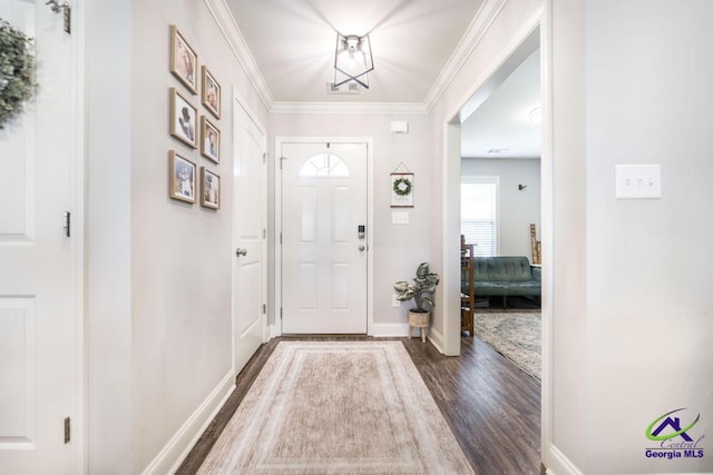 306 Gibson Cir, Kathleen, GA 31047 - foyer entrance with dark wood finished floors and ornamental molding