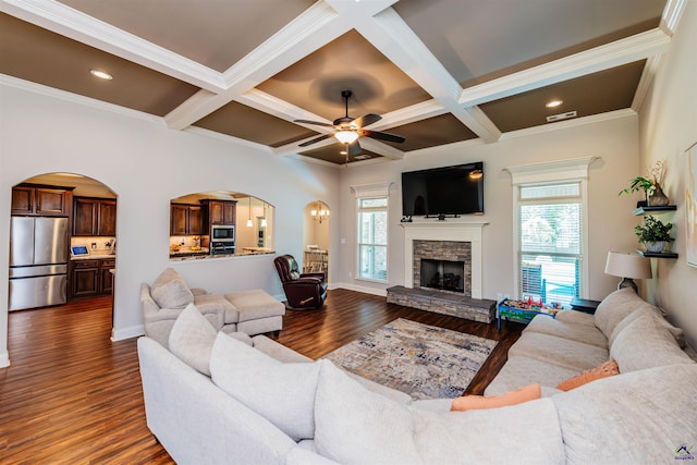 240 Woodlands Blvd, Kathleen, GA 31047 - living room with arched walkways, plenty of natural light, coffered ceiling, dark wood-style floors, and a ceiling fan