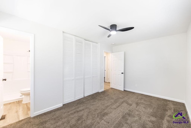804 Arrowhead Trl, Warner Robins, GA 31088 - unfurnished bedroom featuring a closet, carpet floors, connected bathroom, and ceiling fan