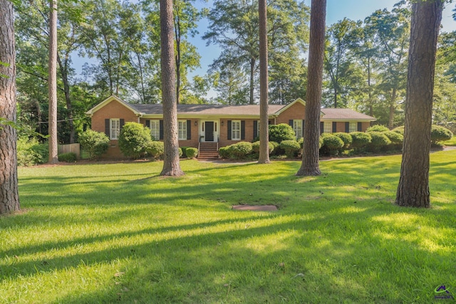 4871 Oxford Rd, Macon, GA 31210 - single story home featuring brick siding and a front lawn